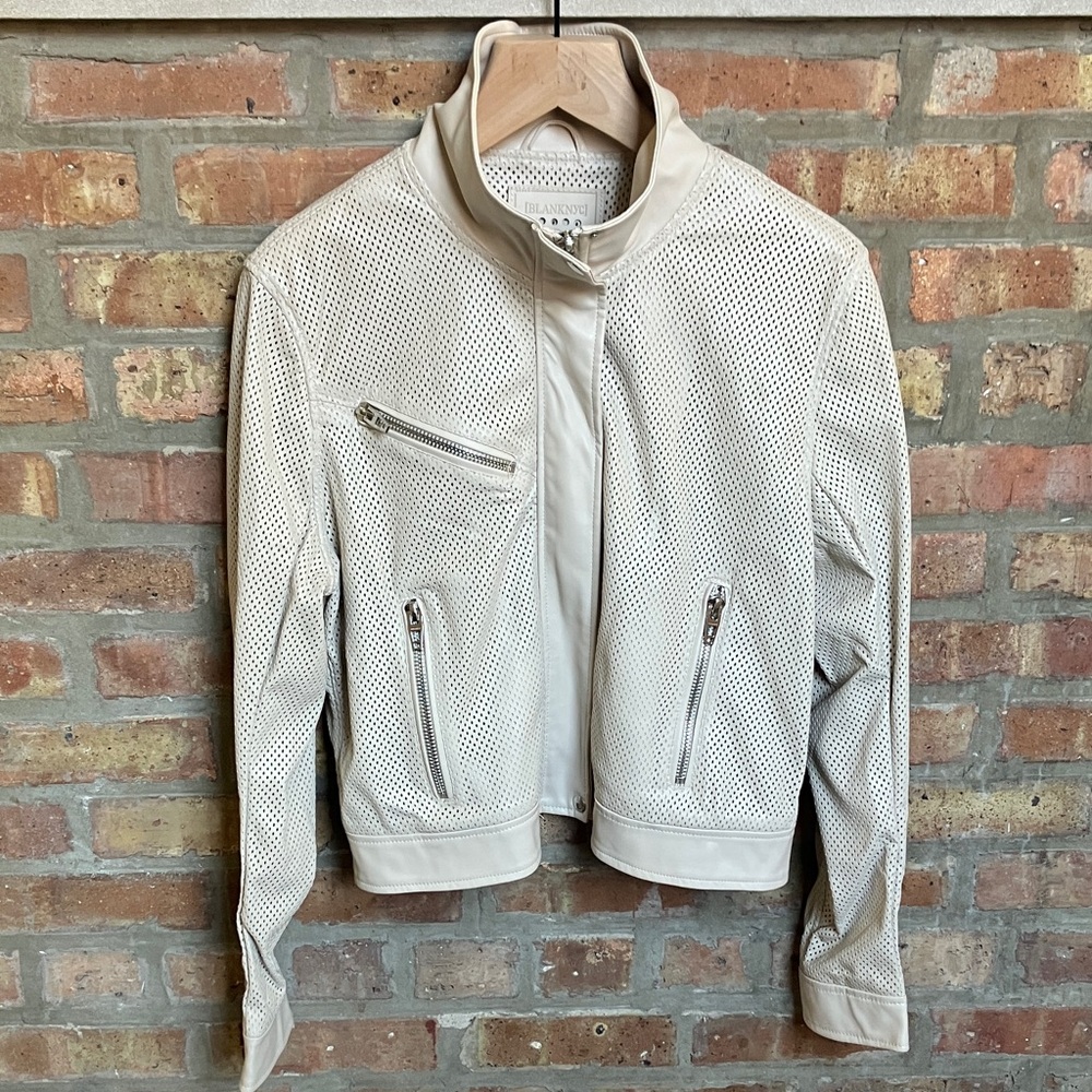 Blank NYC Imelda perforated moto jacket in cream vegan leather.
